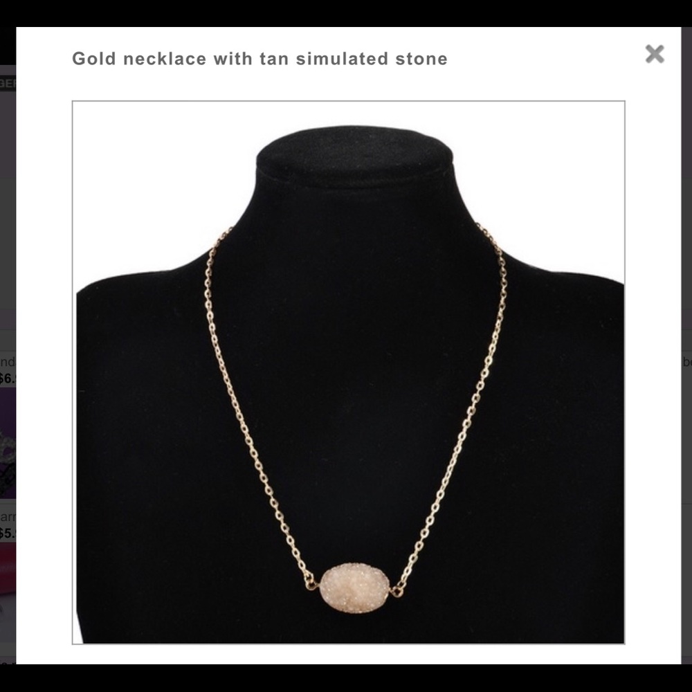 Gold necklace with tan simulated stone